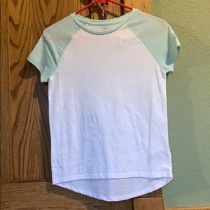 Tee shirt light blue and white.